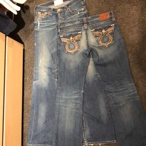 Two bootcut distressed jeans